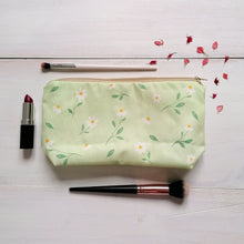 Load image into Gallery viewer, green makeup bag with a watercolour daisy pattern, perfect for storing makeup, skincare and jewellery