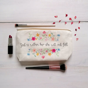 Psalm 46:5 makeup bag with the words, god is within her she will not fall, with a vibrant floral design surrounding the bible verse