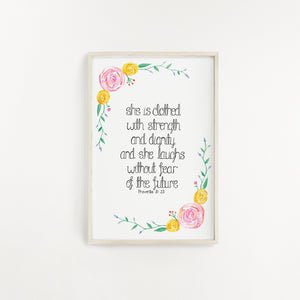 Stunning Bible verse wall art, perfect for a girls bedroom, with a hand painted pink and yellow flower wreath with the words 'She is clothed with strength and dignity and she laughs without fear of the future - Proverbs 31:25' written at the centre of the design.