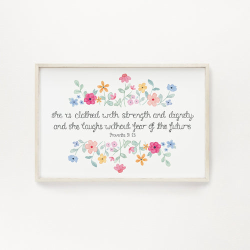  A vibrant floral Bible verse wall print with the words from Proverbs 31:25, 'she is clothed with strength and dignity and she laughs without fear of the future.' A stunning print to add colour and beauty to your home.