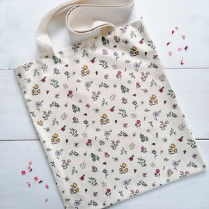 a tote bag with a multicoloured floral pattern, perfect gift for girls