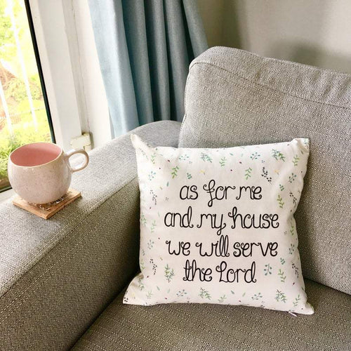 A lovely Bible verse cushion with the words, 'As for me and my house, we will serve the Lord' surrounded by a dainty botanical watercolour pattern.
