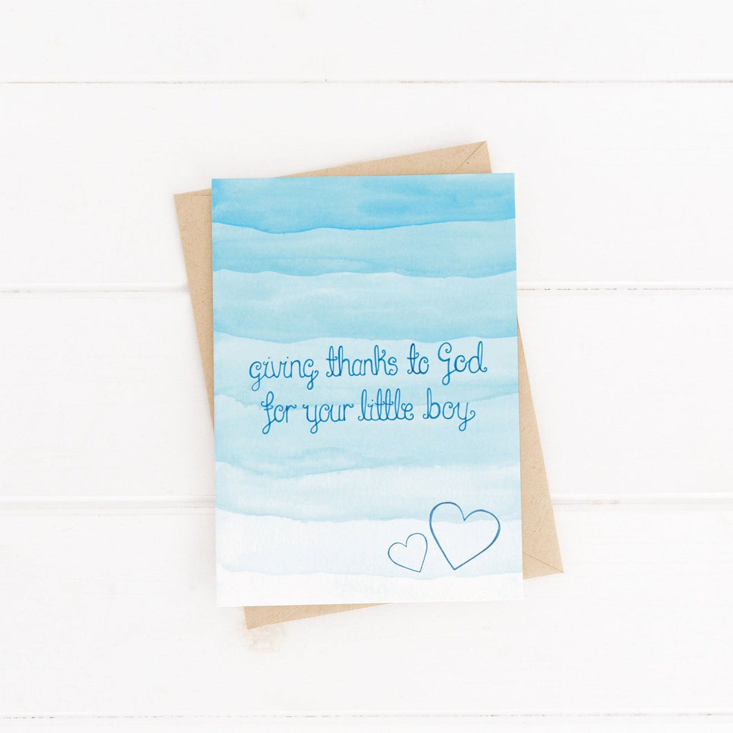 A blue watercolour new baby boy card with the words, 'giving thanks to God for your little boy' the perfect card to celebrate a new baby, dedication or thanksgiving service.