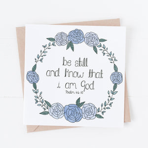 A delicate blue floral wreath watercolour card with the words from Psalm 46:10, 'be still and know that I am God.' An encouraging card for any occasion whether on a birthday, or as a just because. 
