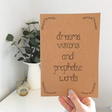 Load image into Gallery viewer, A lovely journal with the words, &#39;dreams, visions &amp; prophetic words&#39; with a dainty leaf pattern in the corners. The perfect journal to gift your Christian friends or treat yourself to.