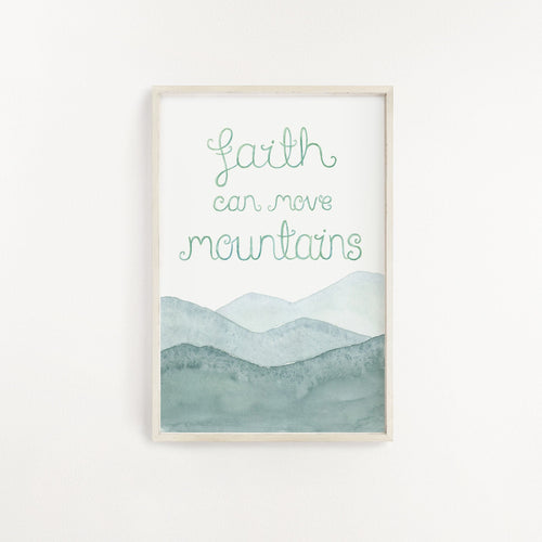 An uplifting wall print with the Christian quote, 'faith can move mountains' lettered above a watercolour mountain landscape. A peaceful print to add to your home.