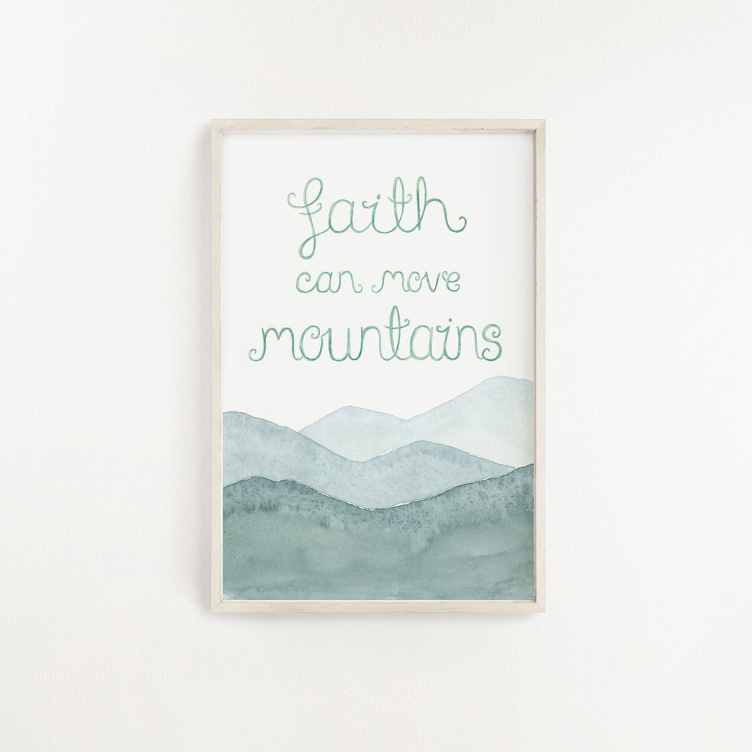 An uplifting wall print with the Christian quote, 'faith can move mountains' lettered above a watercolour mountain landscape. A peaceful print to add to your home.