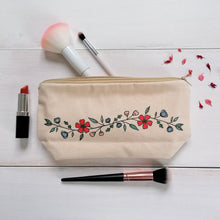 Load image into Gallery viewer, A canvas zip pouch with a pretty floral design painted in the centre with a bible verse on the other side, the perfect gift for christians