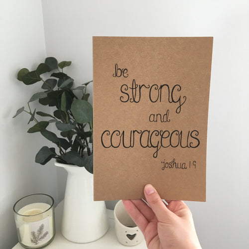 christian notebook with the words, be strong and courageous from joshua 1:9 to write prayers and thoughts inside