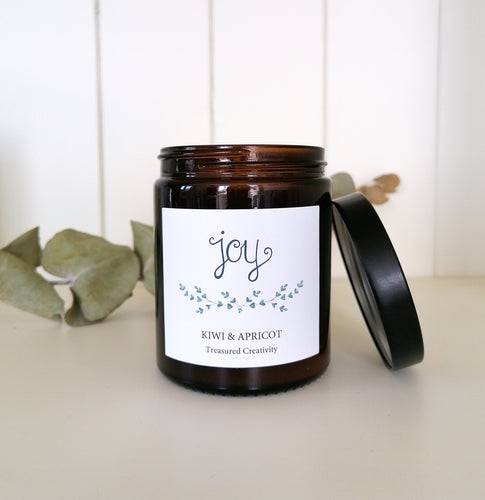 kiwi and apricot soy candle in recycled amber glass jar
