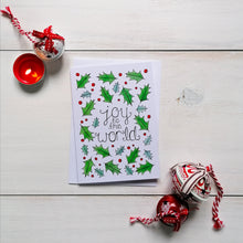 Load image into Gallery viewer, Joy to the world, a jolly holly and berry design Christmas carol card to spread festive cheer this Christmas.