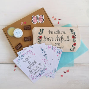 bible verse gift box for women with a christian makeup bag, christian identity prints, organic lip balm, fair trade chocolate and a vinyl sticker