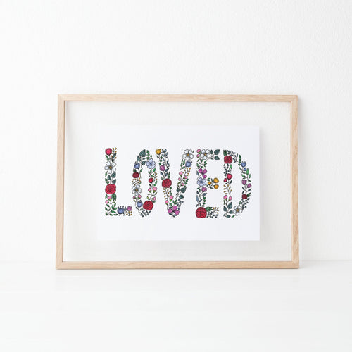 A beautiful & encouraging wall print with the word loved spelt out in vibrant flowers. A beautiful print to hang in your home, or gift a friend and remind them daily that they are loved.