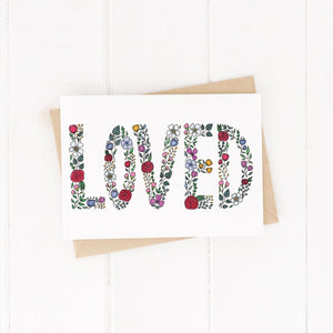 A beautiful friendship card with the word loved spelt out in flowers. A pretty card to encourage your favourite people on their birthday, valentines or as a just because.