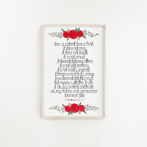 A beautiful print with words taken from 1 Corinthians 13, 'love is patient and kind, it does not envy, it does not boast..' surrounded by a detailed red rose design. A stunning piece of art to hang in your home.