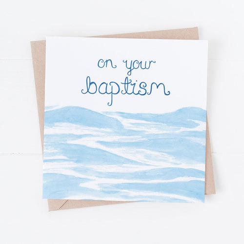 A stunning Christian baptism card with the words, 'on your baptism' and an illustration of water underneath the words. A unique card to fill with encouraging verses and loving words for a friends baptism.