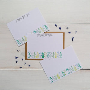 praying for you notecard set with a leaf design at the bottom of the notecard and space in the middle to write your message