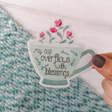 Load image into Gallery viewer, psalm 23 sticker with the words my cup overflows with blessings in a teacup design with pink flowers overflowing