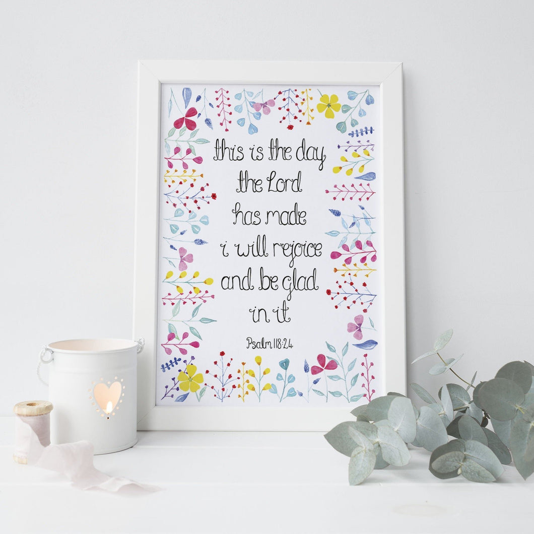 A vibrant hand illustrated floral print with the words from Psalm 118:24, 'this is the day the Lord has made, I will rejoice and be glad in it.' An uplifting wall print to add some colour to your walls or gift a loved one on a special occasion.