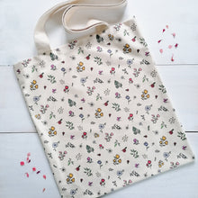 Load image into Gallery viewer, a tote bag with a multicoloured floral pattern, perfect gift for girls
