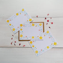Load image into Gallery viewer, set of yellow flower patterned notecards with the floral design painted around the card and with a blank space in the middle to write your message for loved ones