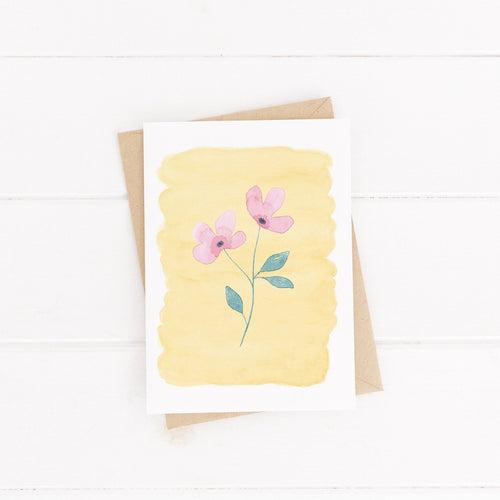 A pretty pink flower greetings card, with a complimentary yellow watercolour background to add some extra joy to the design. A sweet card to send a loved one words of friendship and encouragement. 